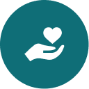 Hand holding heart icon on teal circle.